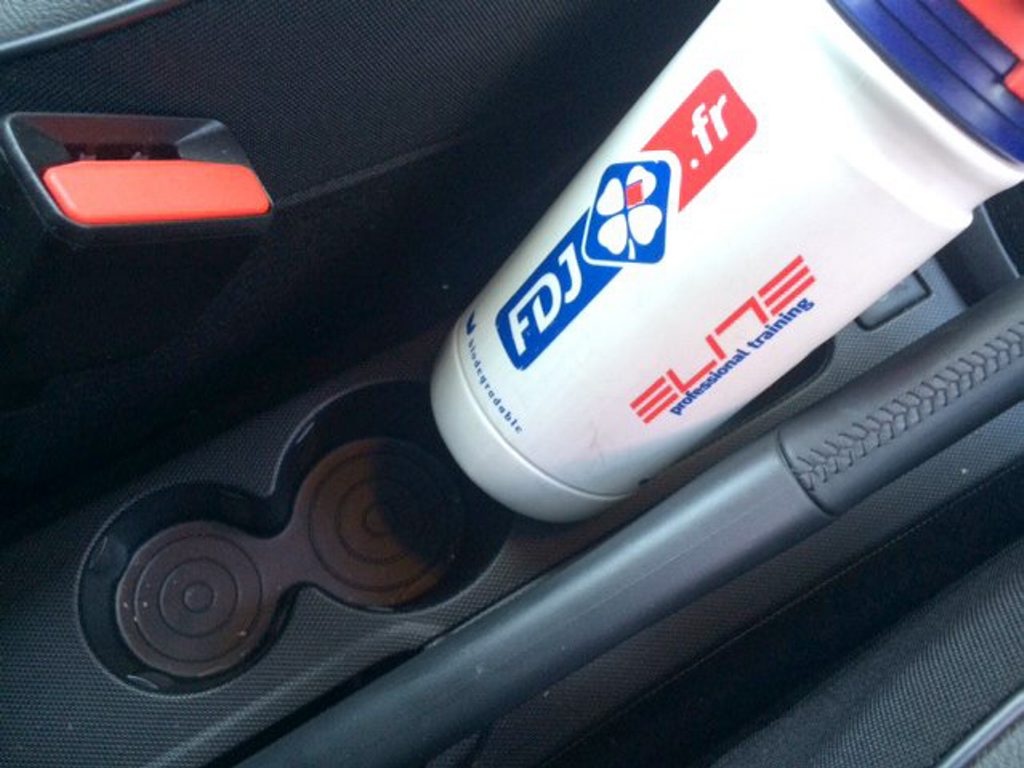 NO CHANCE: Normal size drinks bottle (note the relevant French script) can't even squeeze into the larger cup holder. Espresso coffees it is then... NO CHANCE: Normal size drinks bottle (note the relevant French script) can't even squeeze into the larger cup holder. Espresso coffees it is then...